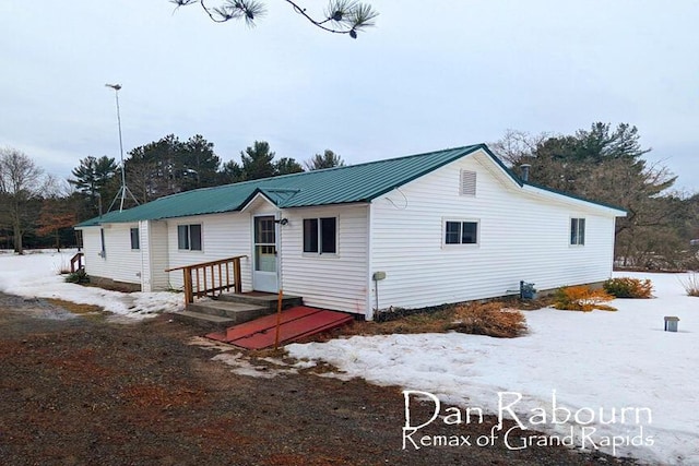 view of front of home with metal roof