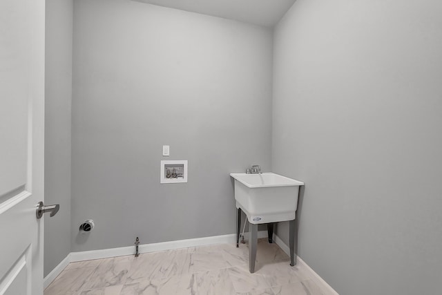 laundry area featuring laundry area, baseboards, hookup for a gas dryer, marble finish floor, and washer hookup