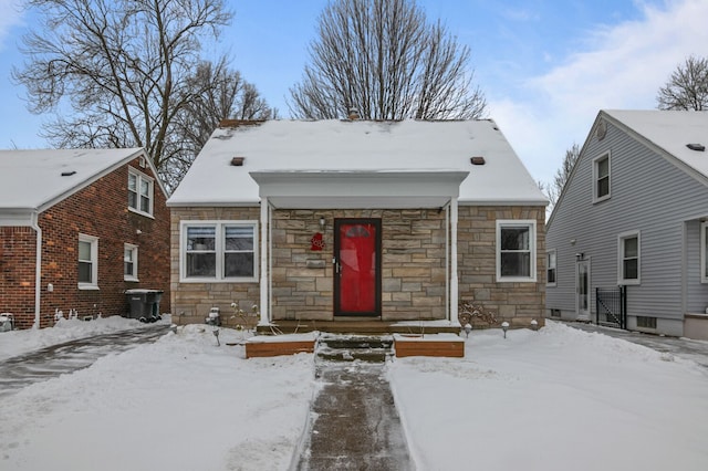 view of front of house with stone siding