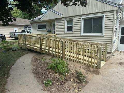 view of front of house featuring a deck