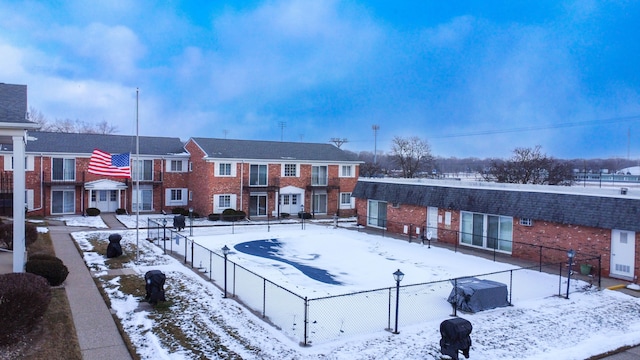 view of property's community with fence