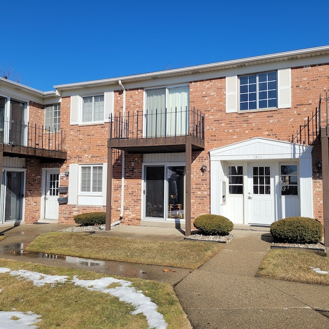 view of front of property with brick siding