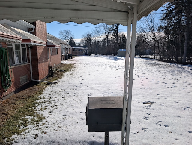 view of snowy yard