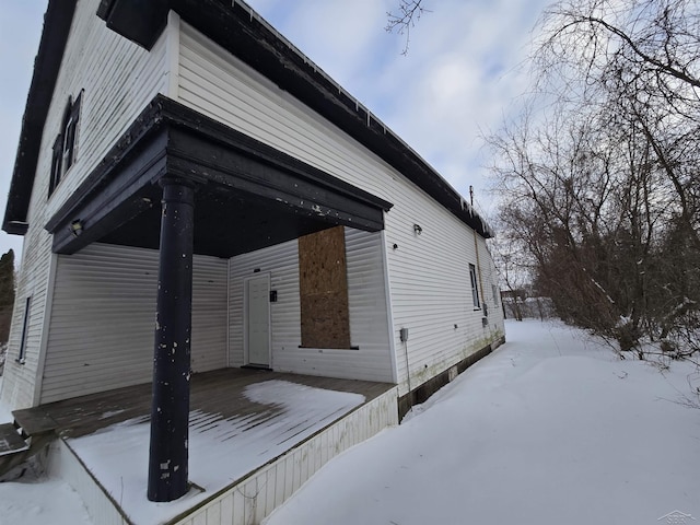 view of snow covered property