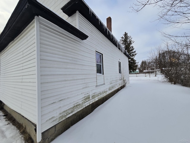 view of snow covered exterior