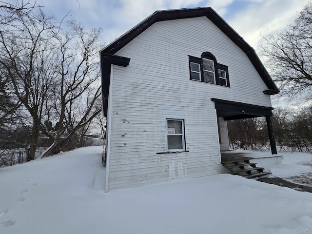 view of snow covered property