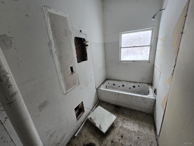 full bath featuring a tub to relax in