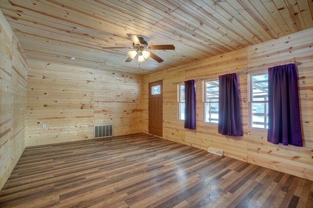 6619 M 18, Coleman, MI 48618 - spare room featuring wooden ceiling, wooden walls, hardwood / wood-style flooring, a ceiling fan, and plenty of natural light