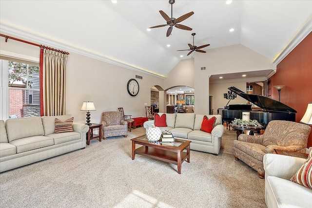 living room featuring arched walkways, recessed lighting, visible vents, light carpet, and high vaulted ceiling