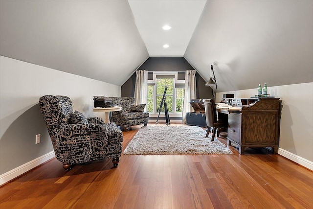 home office with vaulted ceiling, baseboards, and wood finished floors