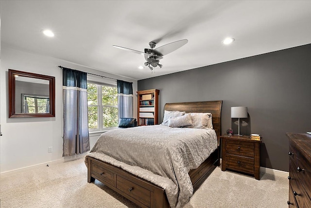 bedroom featuring recessed lighting, baseboards, and light colored carpet