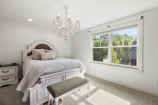 carpeted bedroom with a chandelier, recessed lighting, and baseboards