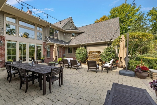 view of patio / terrace featuring french doors and outdoor dining space