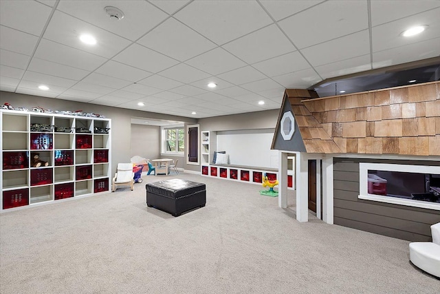 playroom with carpet floors, a drop ceiling, and recessed lighting