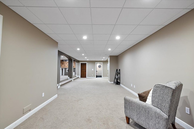 sitting room featuring recessed lighting, light carpet, a paneled ceiling, and baseboards