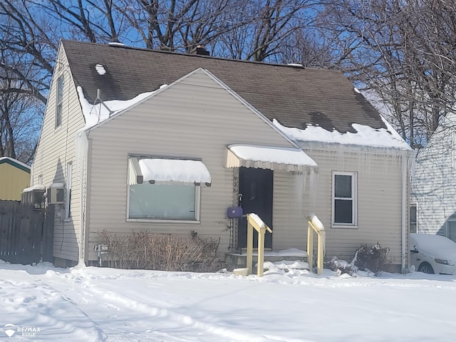 view of front of home with roof with shingles