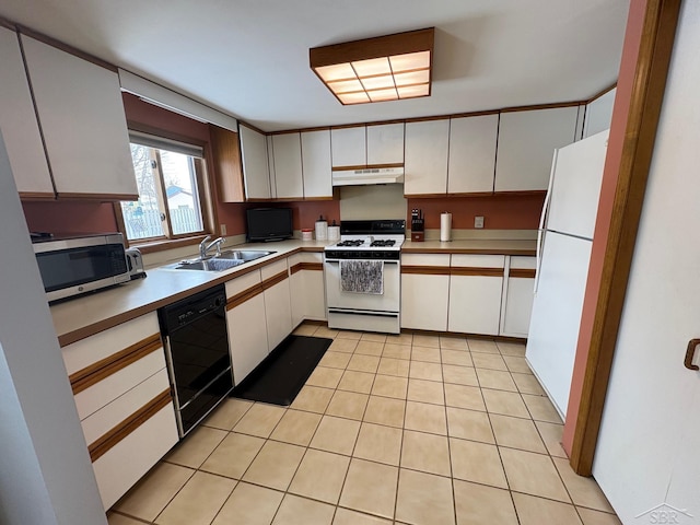 kitchen with under cabinet range hood, white appliances, a sink, white cabinetry, and light countertops