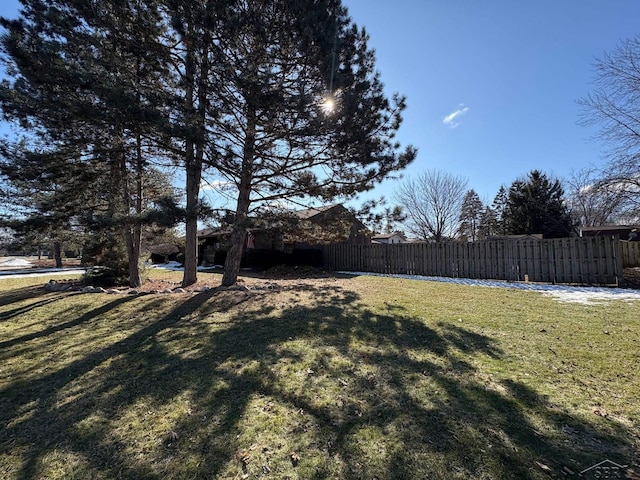 view of yard featuring fence