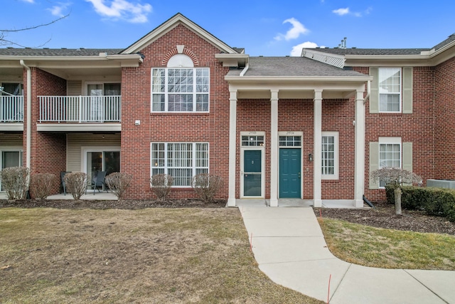 multi unit property featuring brick siding