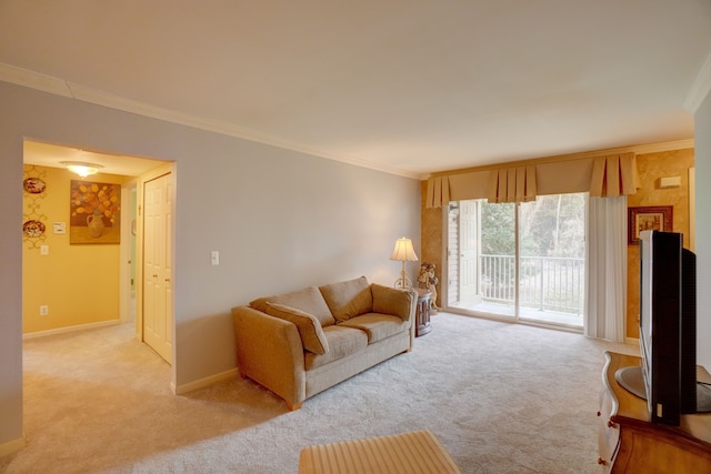 living room with carpet flooring, baseboards, and ornamental molding