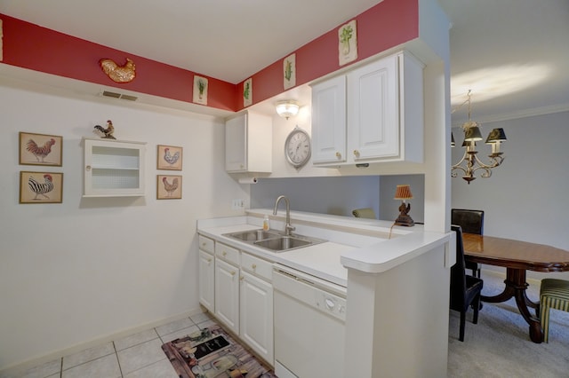 kitchen with a sink, white cabinetry, white dishwasher, and light tile patterned floors