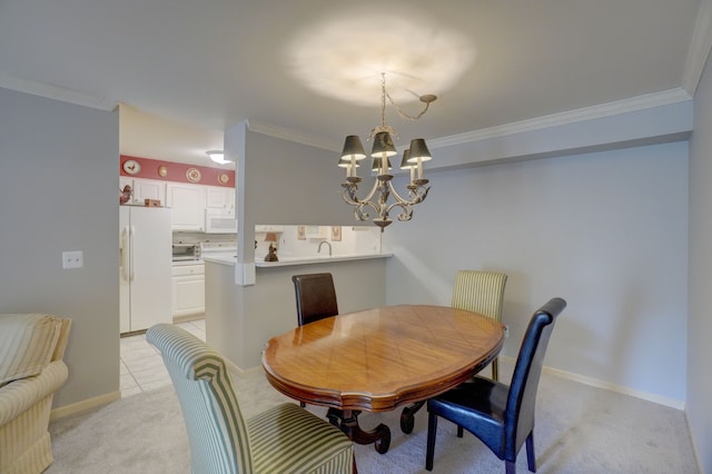 dining room with an inviting chandelier, light colored carpet, and ornamental molding