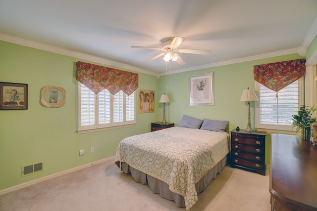 bedroom featuring visible vents, light carpet, ornamental molding, a ceiling fan, and baseboards