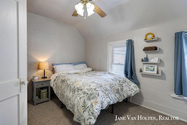 carpeted bedroom featuring a ceiling fan, vaulted ceiling, and baseboards