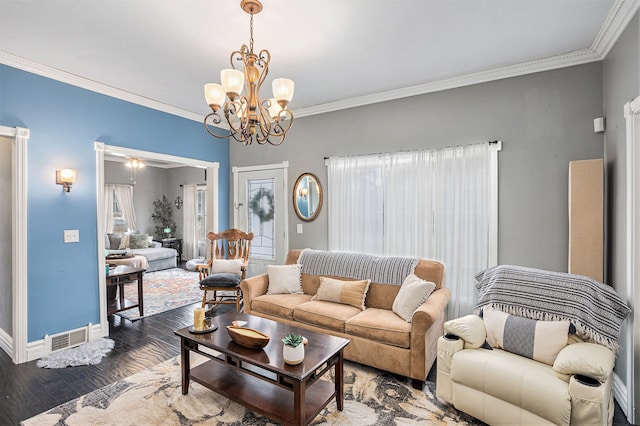 3342 Oak Grove Rd, Howell, MI 48855 - living room with crown molding, visible vents, wood finished floors, baseboards, and a notable chandelier