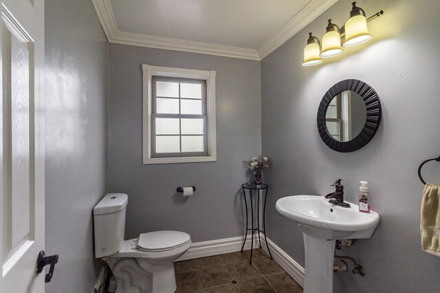 3342 Oak Grove Rd, Howell, MI 48855 - bathroom featuring tile patterned floors, ornamental molding, baseboards, and toilet