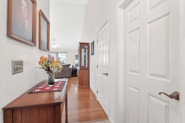 hallway with light wood-style flooring