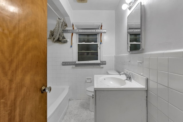 bathroom featuring a tub to relax in, toilet, vanity, a shower with curtain, and tile patterned floors