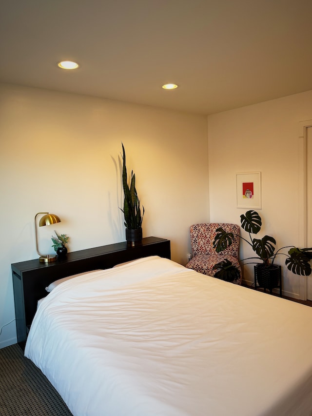 bedroom with carpet flooring and recessed lighting