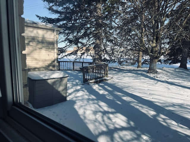 view of snow covered deck