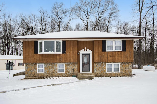 bi-level home with stone siding