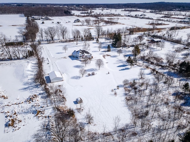 snowy aerial view with a rural view