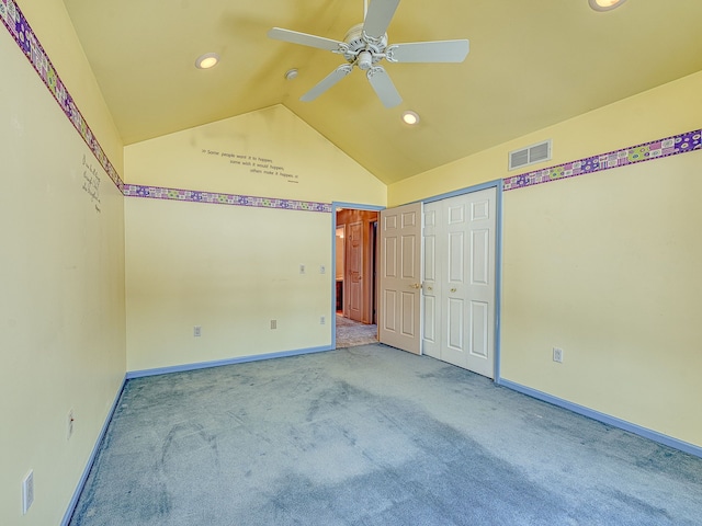 unfurnished bedroom with recessed lighting, light colored carpet, visible vents, baseboards, and vaulted ceiling