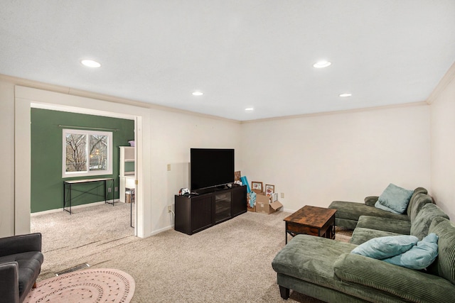 carpeted living room with baseboards, visible vents, crown molding, and recessed lighting