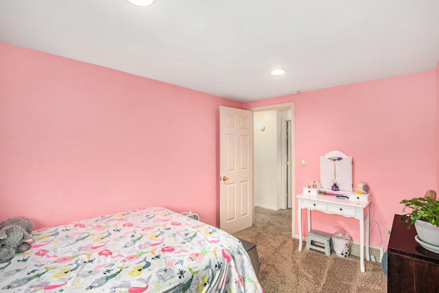 bedroom with carpet and recessed lighting