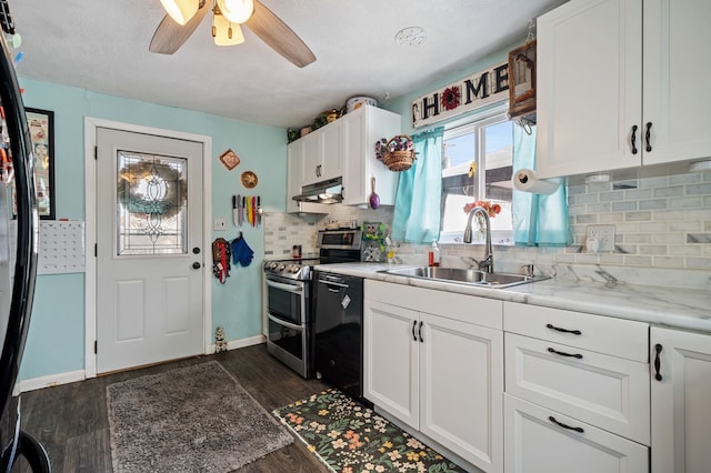 kitchen with dark wood-style floors, white cabinetry, a sink, under cabinet range hood, and black appliances