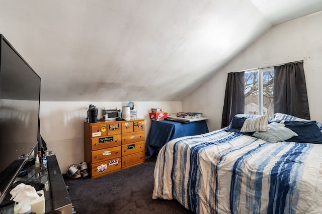 carpeted bedroom featuring vaulted ceiling