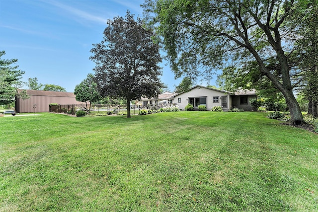 view of yard with fence