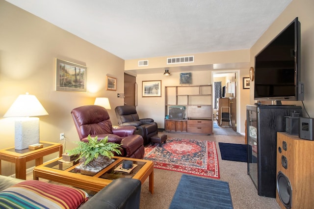 carpeted living room with visible vents