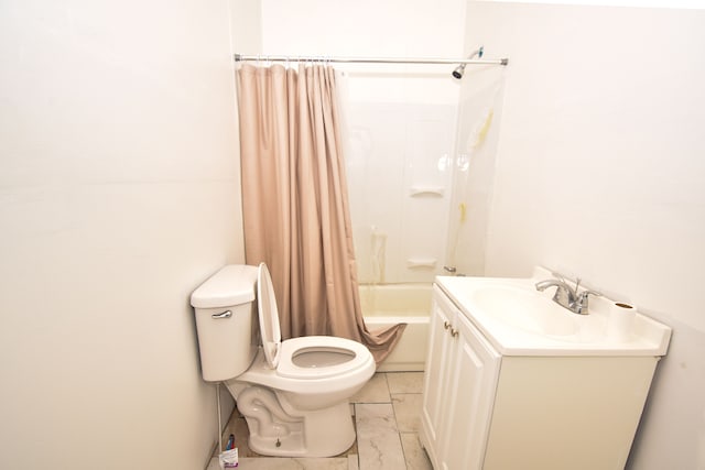 bathroom featuring toilet, shower / bath combo with shower curtain, and vanity