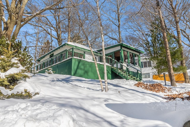 view of front of property with stairs