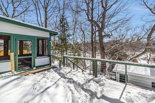 view of snow covered deck