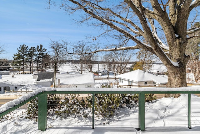 view of snow covered deck