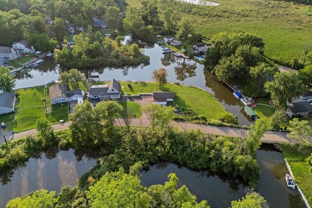 bird's eye view with a water view and a residential view