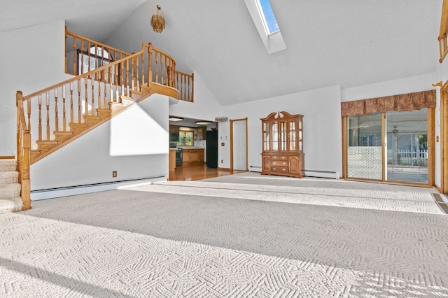 living area with high vaulted ceiling, a skylight, stairway, and baseboard heating