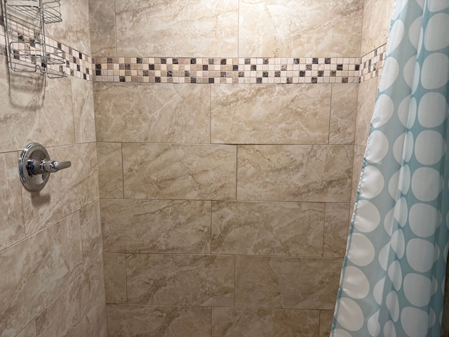 details featuring a tile shower